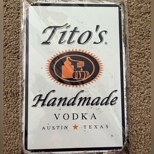 Tito’s wall sign